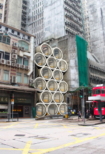 Estruturas de Opods podem ser empilhadas, transformando-se em condomínios viáveis para a moradia da população jovem de Hong Kong.  Crédito: JamesLaw Cybertecture