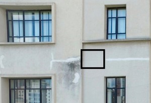 Imagem sem uso de câmera termográfica mostra fachada de edifício com área danificada e área aparentemente saudável (quadrado menor) Crédito: IPT